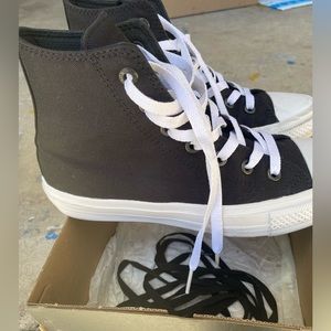 Converse High-Tops. Women’s Size 8 (men’s size 6). Used, in good condition.